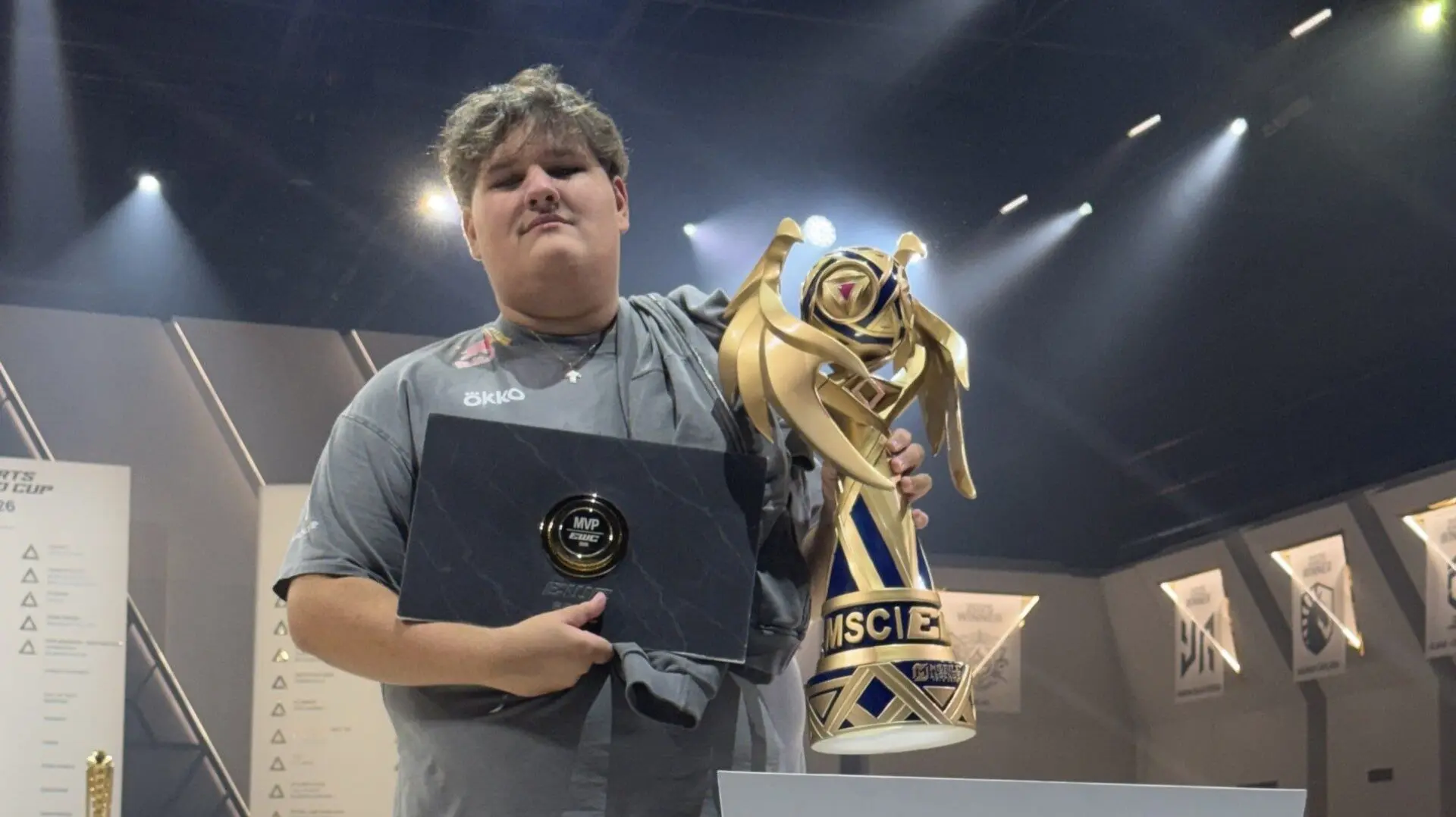 Photo of Kid Bomba with his MLBB Mid Season Cup 2026 MVP award